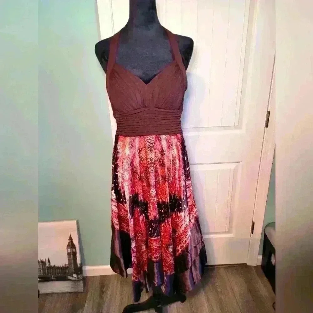 Cato Halter top With adjustable tie knot at the neck size 10